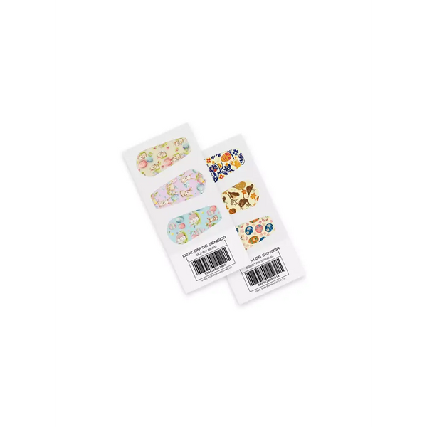 Adhesive bandage strips with colorful patterns for Dexcom G6 blood glucose monitor