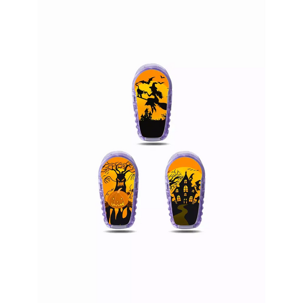 Dexcom G6 Halloween Stickers - Set of 3 featuring haunted house-themed designs with witches, pumpkins, and spooky silhouettes on a vibrant orange background.