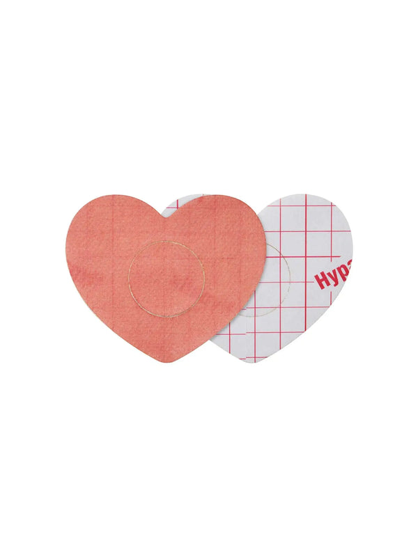 Freestyle Libre 2 heart patch front and back view showing adhesive layer and full protective coverage