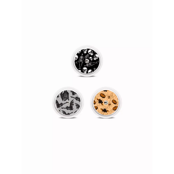 Freestyle Libre 2 Halloween Stickers - Set of 3 with creepy designs including skeletons, bats, and pumpkins with spiders on an orange background.