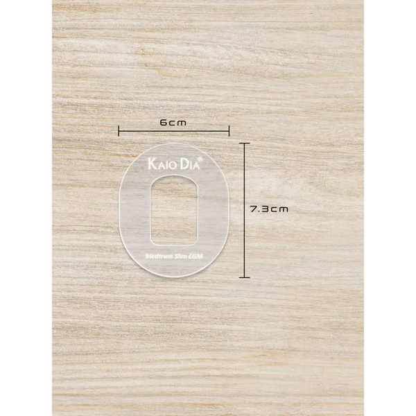 CGM sensor patch template on wooden background, showing dimensions and Kaio Dia branding.
