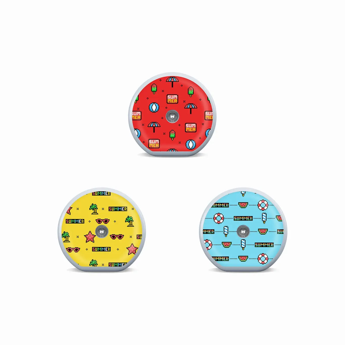 Three Accu-Chek SmartGuide sensor stickers in red, yellow and blue pixel-art designs with playful summer icons. Immagine