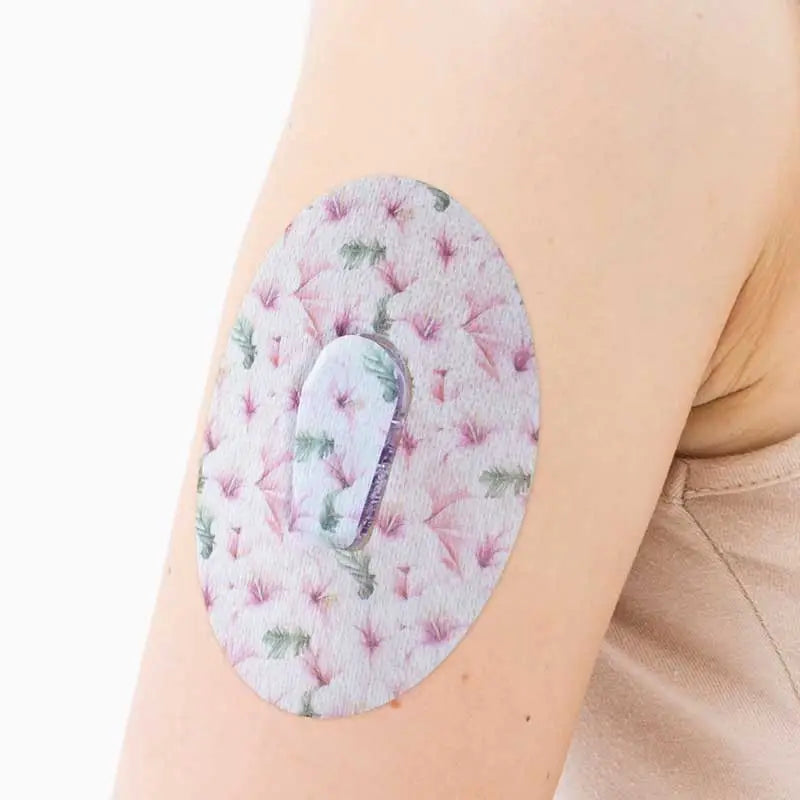 dexcom G6 sensor cgm patch with sticker on the arm Immagine