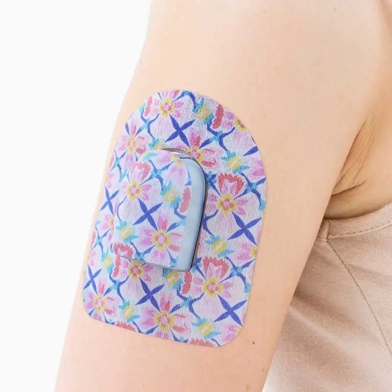omnipod pod colorful patch on the arm Immagine