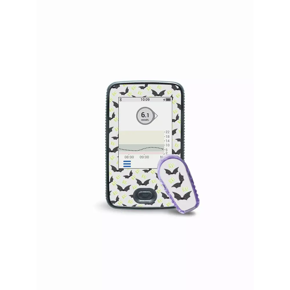 Halloween-themed Dexcom G6 receiver and transmitter stickers for festive device decoration.