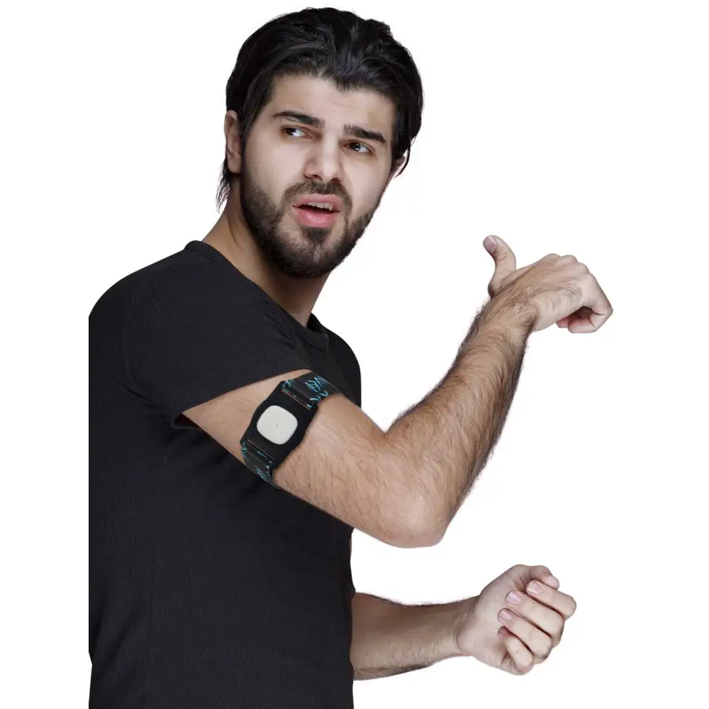 Person in black t-shirt showcasing Medtronic Simplera CGM with adjustable armband