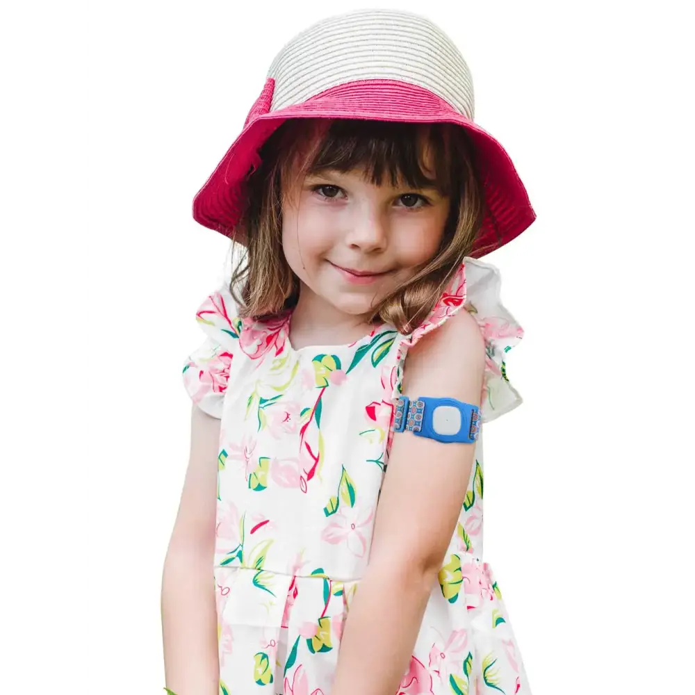 Child wearing Medtronic Simplera armband with rotating clip and metal adjuster.