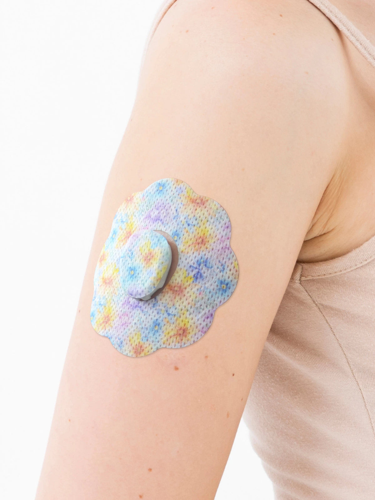 Cerotto adesivo per Dexcom G7, forma biscotto, sul braccio, primo piano