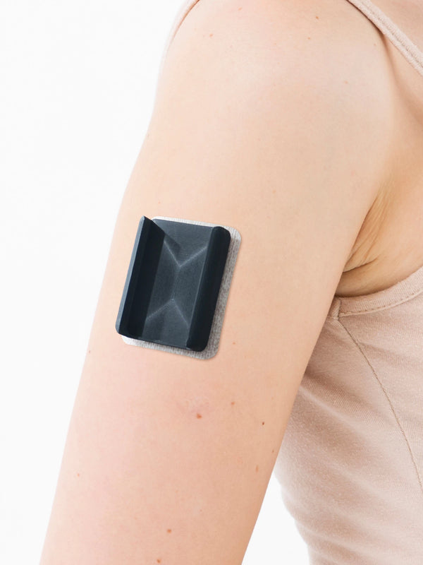 Dia-Mobi Clip attached to the upper arm before applying the Tandem Mobi patch