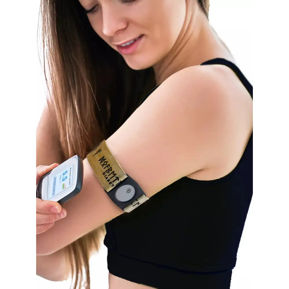 Freestyle Libre 3 Armband Viking Edition worn by a woman, showcasing intricate Viking runes, ensuring sensor security and style.