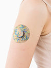 freestyle libre 3 overpatch with tropical design worn on arm for secure sensor protection and stylish daily diabetes use