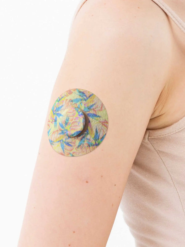 freestyle libre 3 overpatch with tropical design worn on arm for secure sensor protection and stylish daily diabetes use
