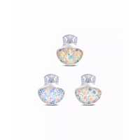 Set of three Guardian Enlite Stickers featuring pastel butterflies and floral designs with a vinyl-laminated, waterproof finish for sensor protection and style.