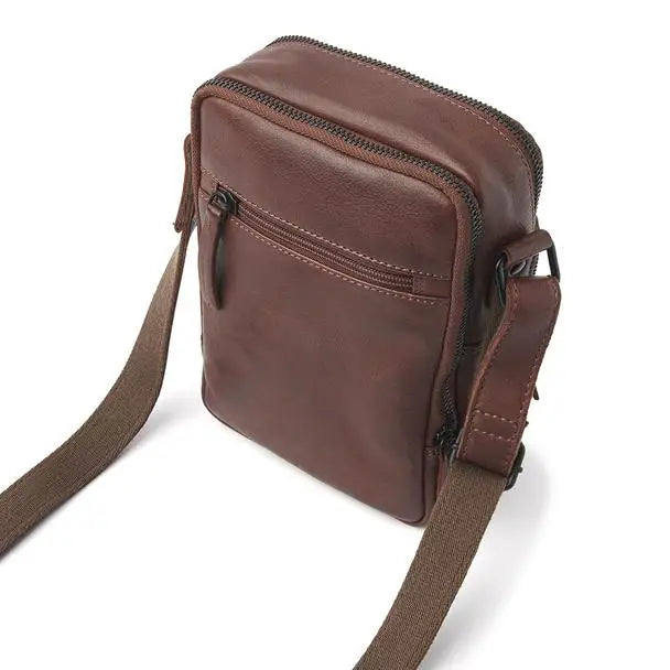 Elegant leather diabetes shoulder bag from Sweet Collections, featuring durable cowhide leather, multiple compartments for diabetes supplies and personal items, with an adjustable strap for comfort.