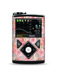 Medtronic MiniMed with Summer Edition stickers in vibrant tropical designs.