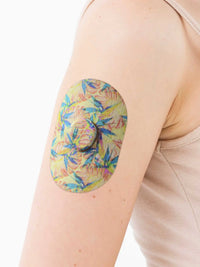 Cerotto adesivo per Dexcom G7, fantasia Tequila Sunrise, sul braccio